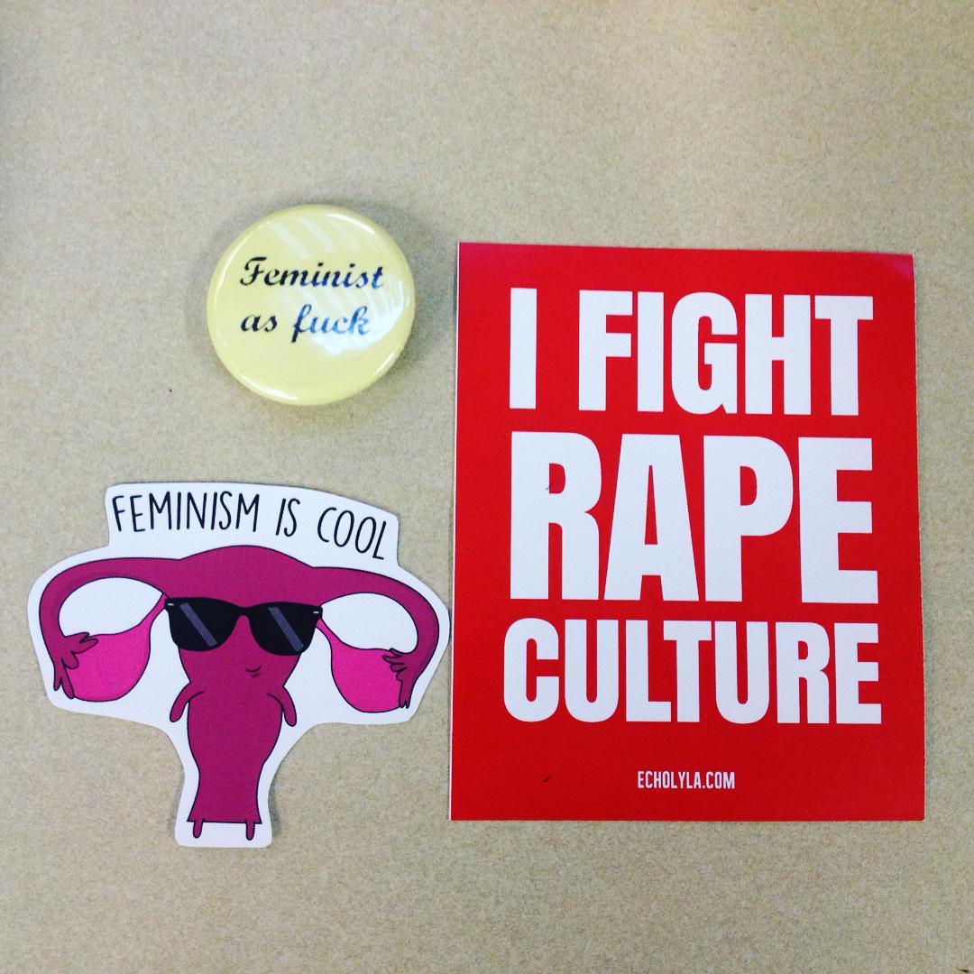 Some of the gifts I received as part of my award: a pin that says